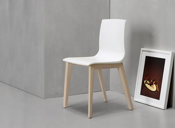 Smilla chair in technopolymer with solid beech legs by Scab Design.