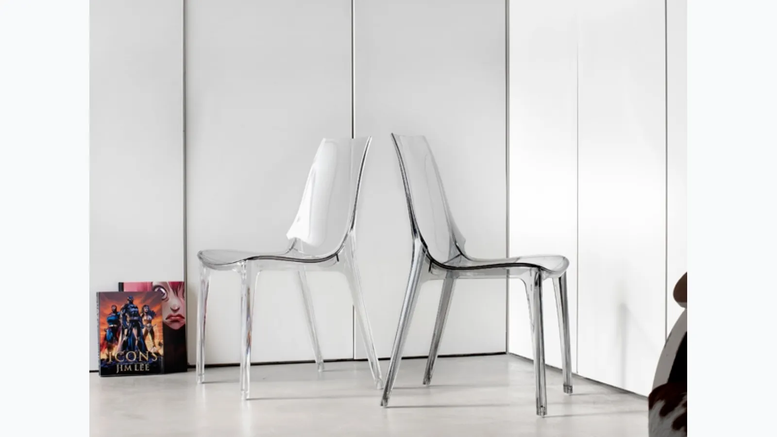 Vanity transparent polycarbonate stackable chair without armrests by Scab Design.