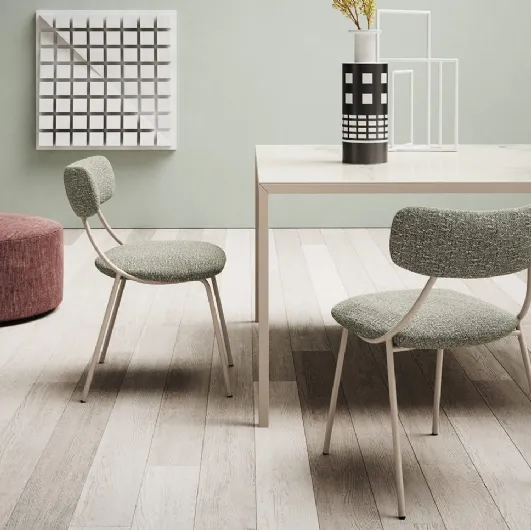Yoko chair in padded fabric by Novamobili.