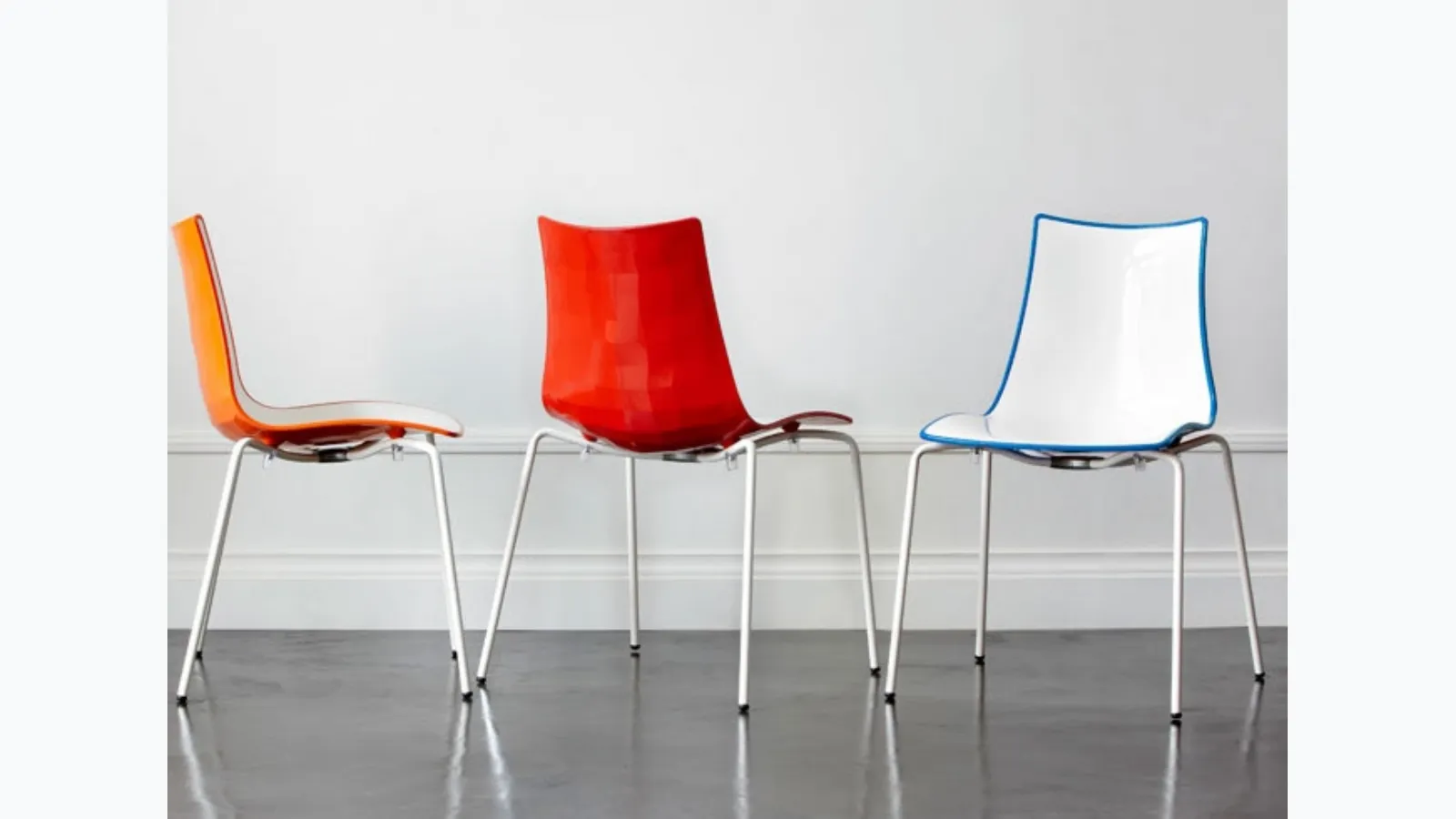 Zebra chair with a two-tone glossy and faceted polymer shell by Scab Design.