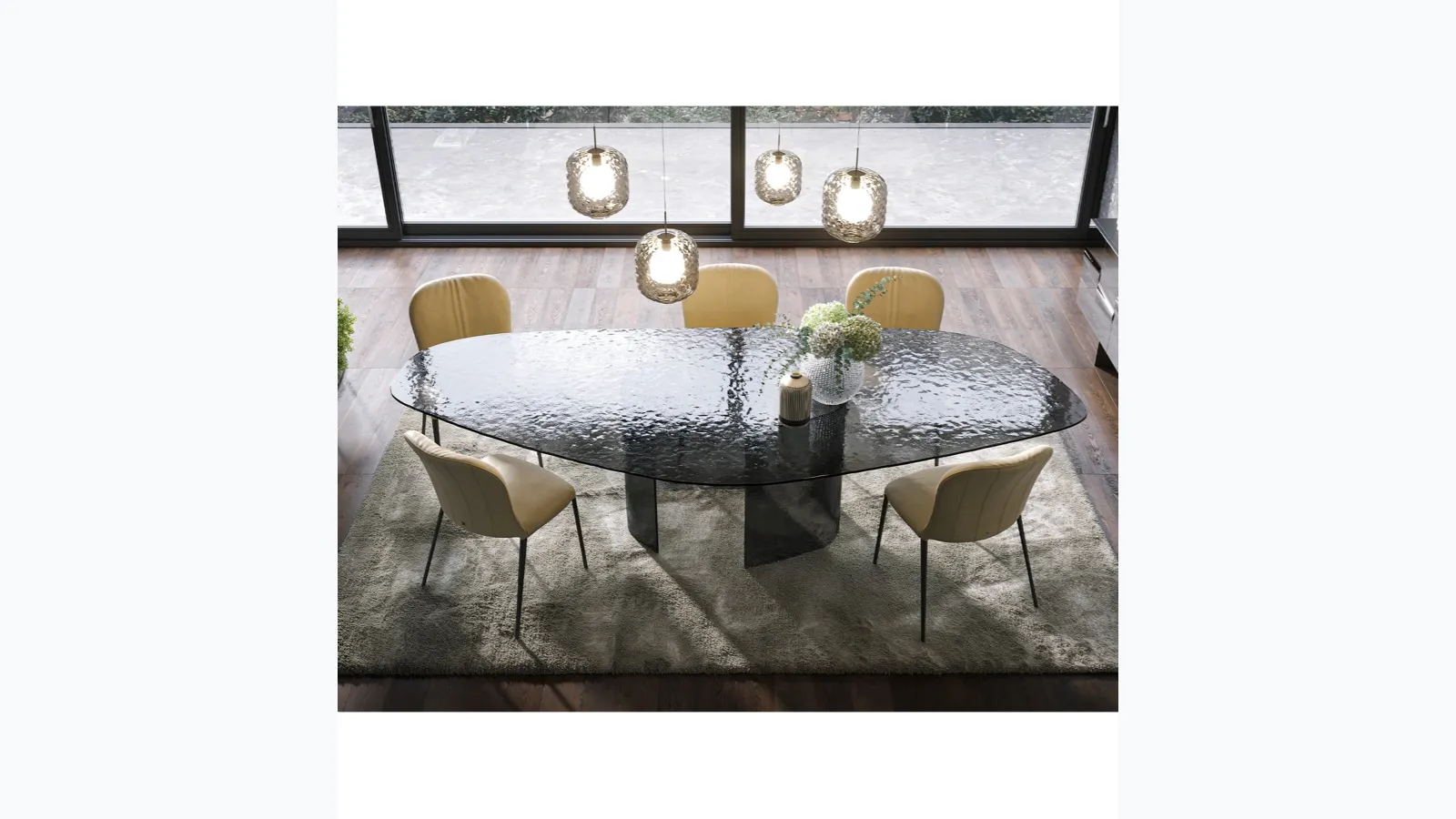 Curved and hammered glass table Ablos by Tonin Casa.