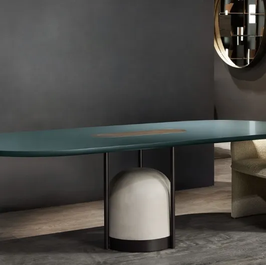 Arcane oval table in lacquered finish with Cantori cement base.