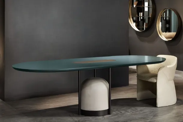 Arcane oval table in lacquered finish with Cantori cement base.