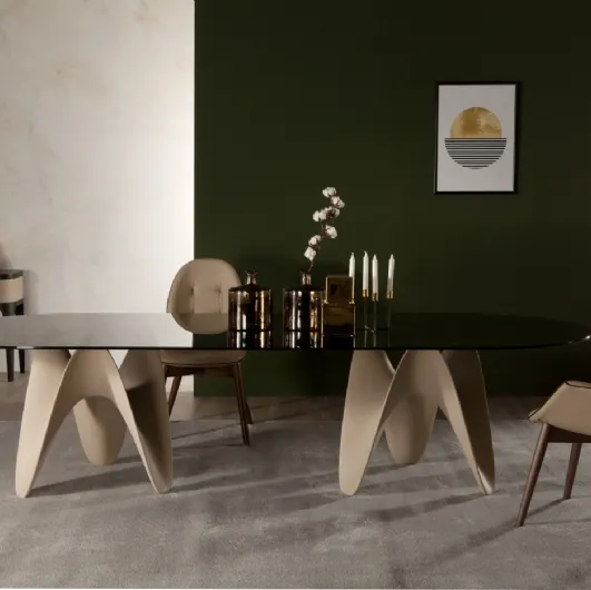 Table with double Technoril base and Big Gaya glass top by Tonin Casa.