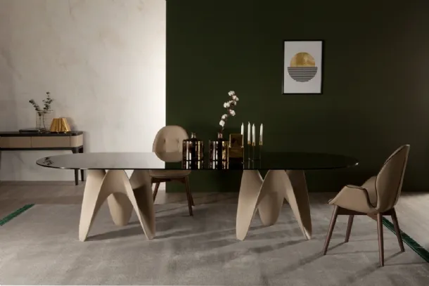 Table with double Technoril base and Big Gaya glass top by Tonin Casa.