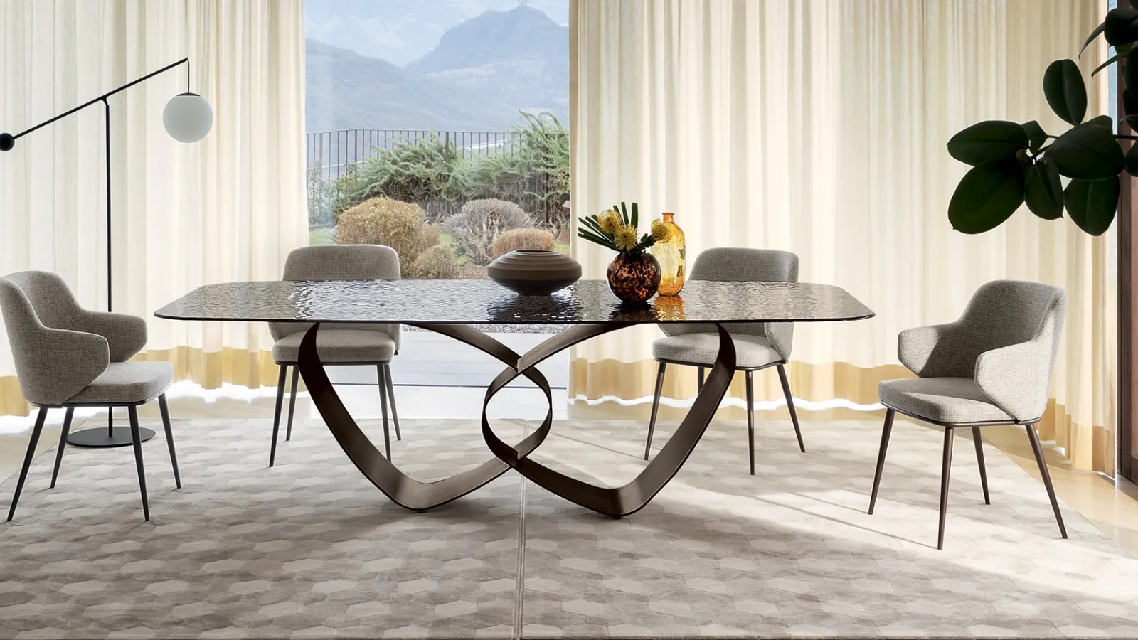 Breeze table with glass top and metal base by Calligaris.