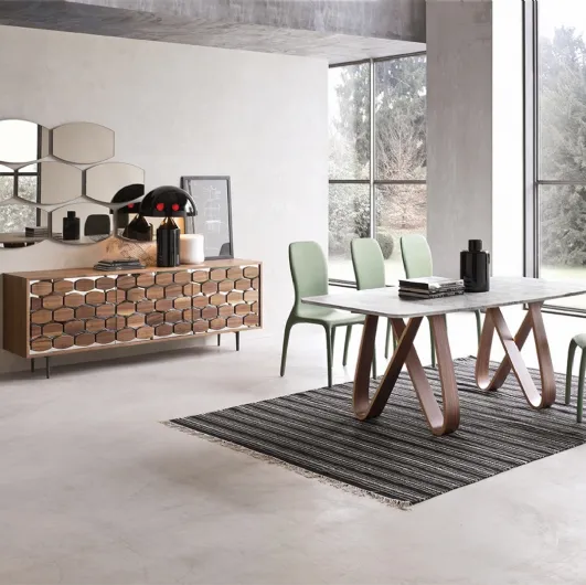 Butterfly table with a base in thermocurved wood and a top in Tonin Casa marble.