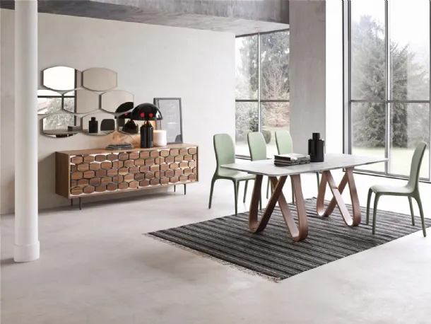 Butterfly table with a base in thermocurved wood and a top in Tonin Casa marble.