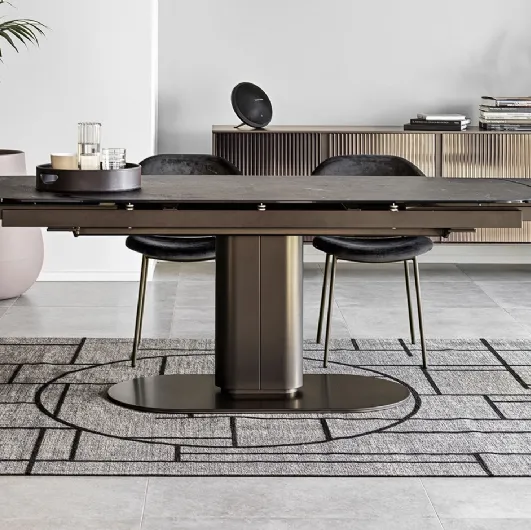 Extendable Cameo table with marble-effect ceramic top by Calligaris