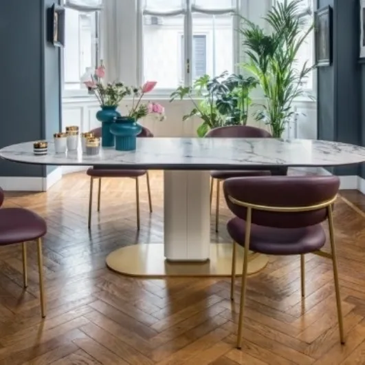 Cameo table in marble-effect ceramic by Calligaris.