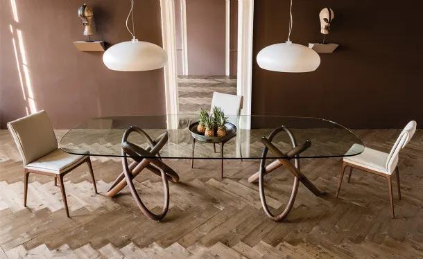 Table with glass top and wooden support 