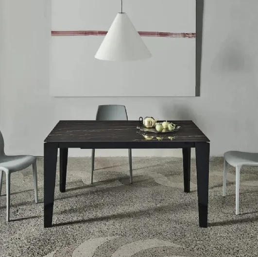 Cruz XXL extendable table with SuperMarble top and lacquered steel base by Bontempi.