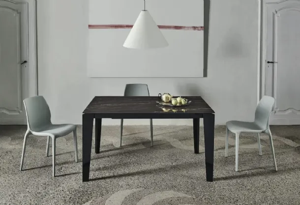 Cruz XXL extendable table with SuperMarble top and lacquered steel base by Bontempi.