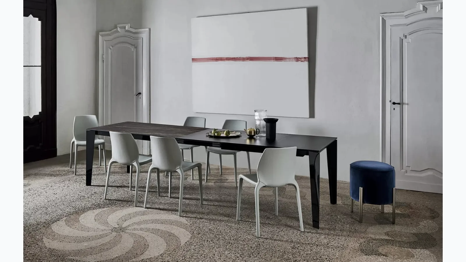 Extendable Cruz XXL table with SuperMarmo top and lacquered steel base by Bontempi.