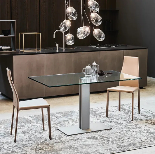 Elvis table with central steel base and glass top by Cattelan Italia