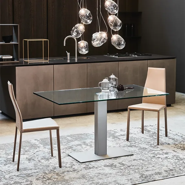 Elvis table with central steel base and glass top by Cattelan Italia