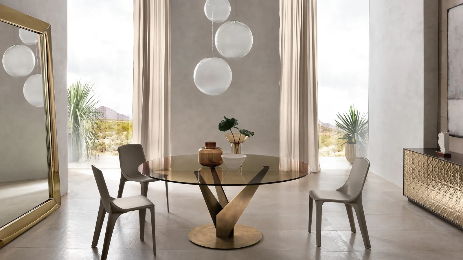 Epsylon round table with bronze glass top and brass-plated metal base by Fiam.