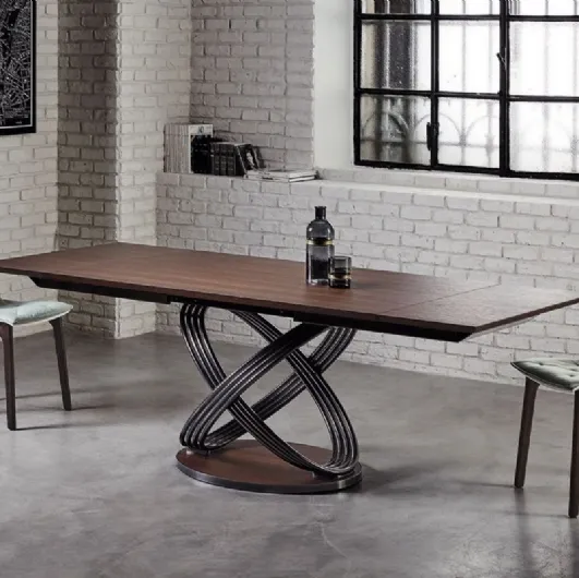 Fusion table with walnut veneer top by Bontempi.