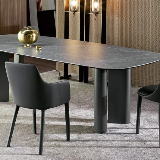 Geometric Table by Bonaldo with ceramic top and metal base.