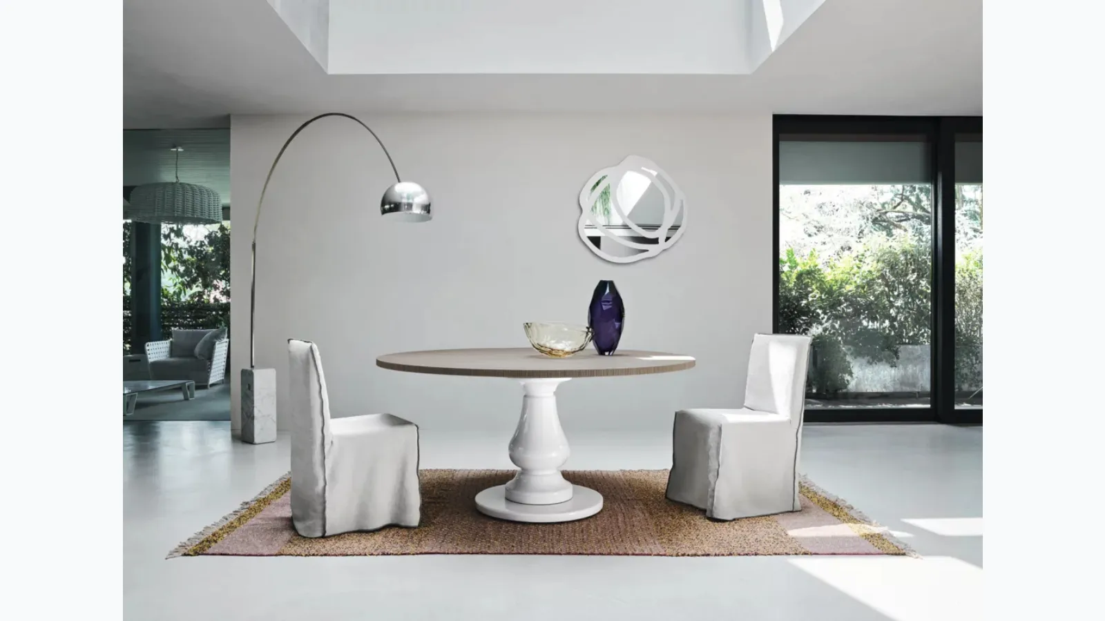 Gray 38 table with wooden top and white millgres base by Gervasoni.