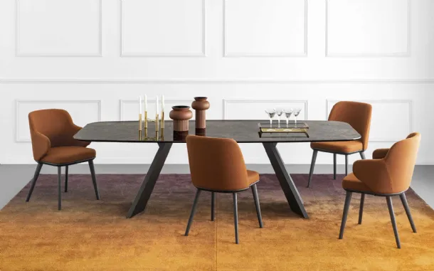 Icaro elliptical table with ceramic top and wood veneer base by Calligaris.