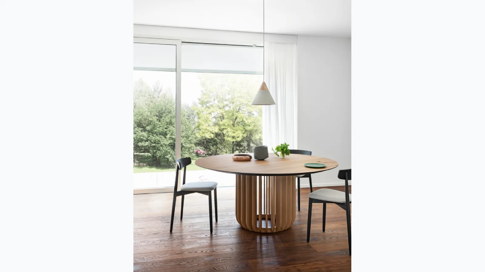 Round Juice wooden table by Miniforms.