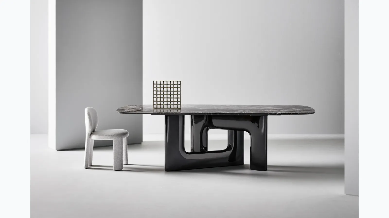 Liaison design table with marble top and polyurethane base by Bonaldo
