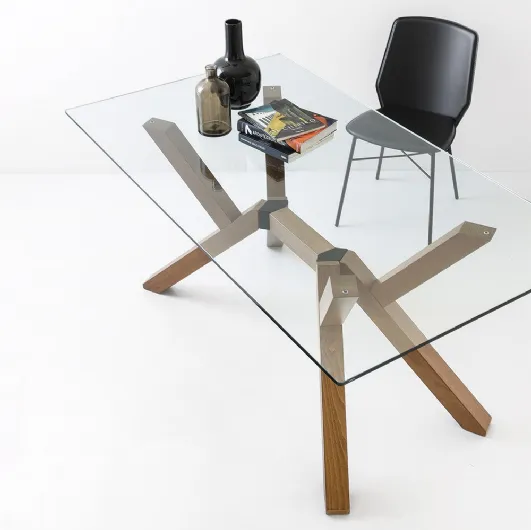 Mikado table with glass top and Connubia wooden legs.