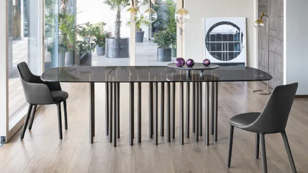 Mille table with glass top and painted metal base by Bonaldo.
