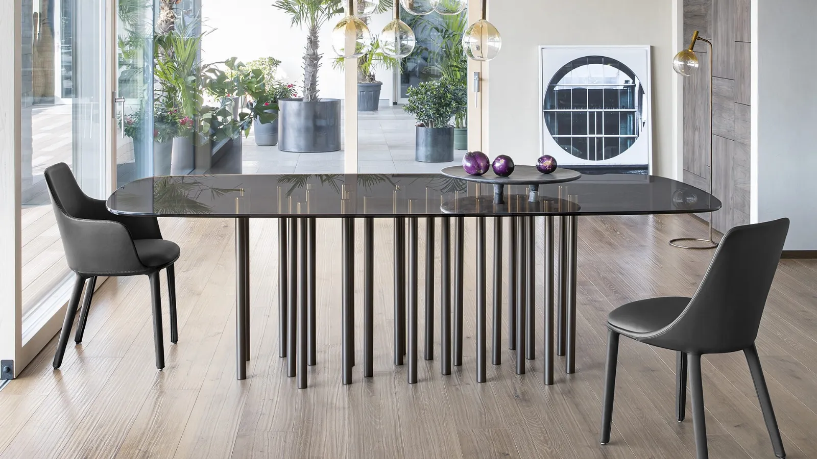 Mille table with glass top and painted metal base by Bonaldo.