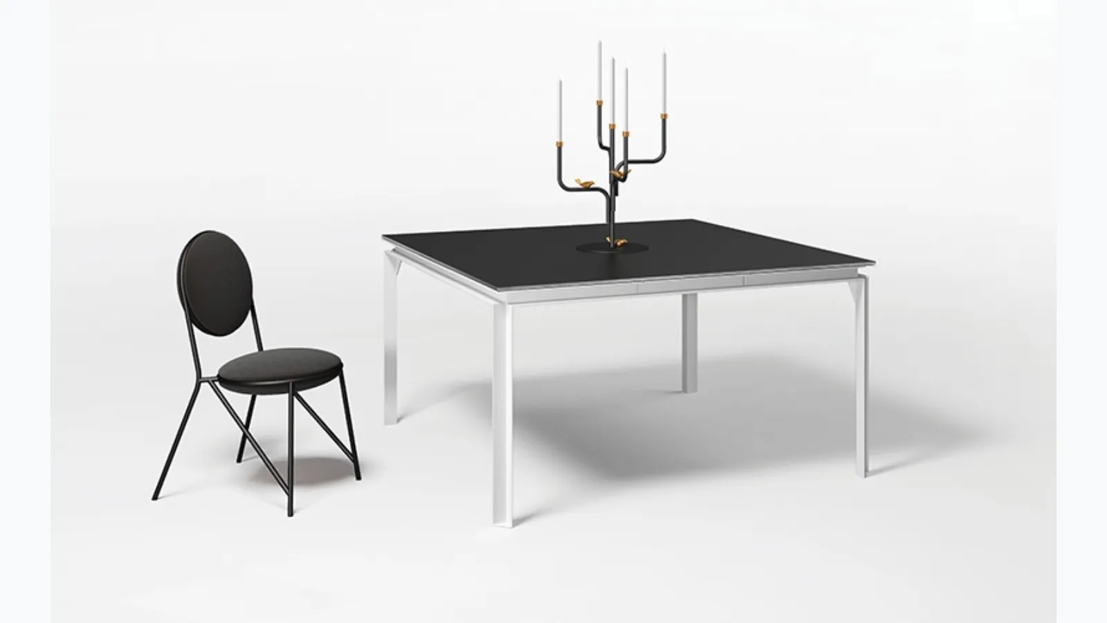 Mille glass and metal table by Minotti Italia.