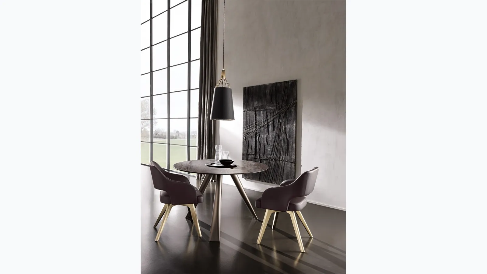 Milos round ceramic table with iron tubular legs by Cantori.