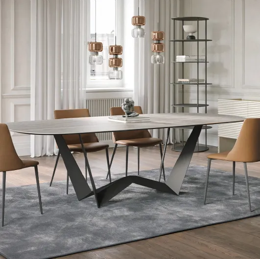 Reverse table in Travertine gres by Tonin Casa.