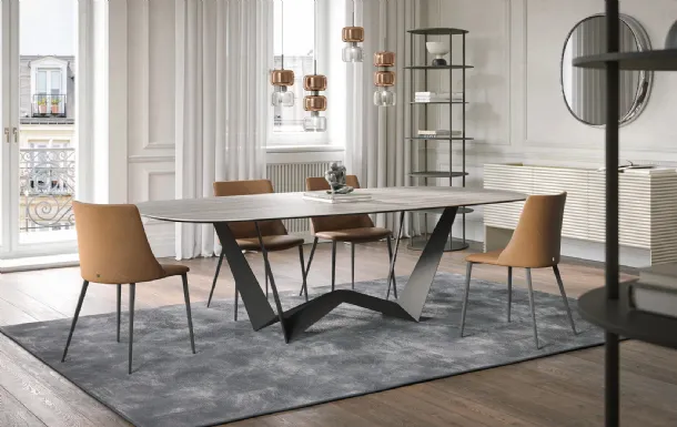 Reverse table in Travertine gres by Tonin Casa.