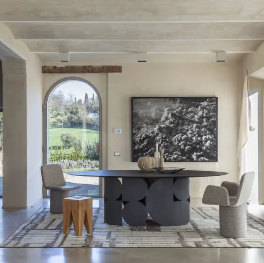 Shape table with wooden top and metal base by Mogg.