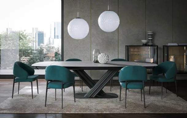 Sipario Ext travertine stoneware table by Tonin Casa.