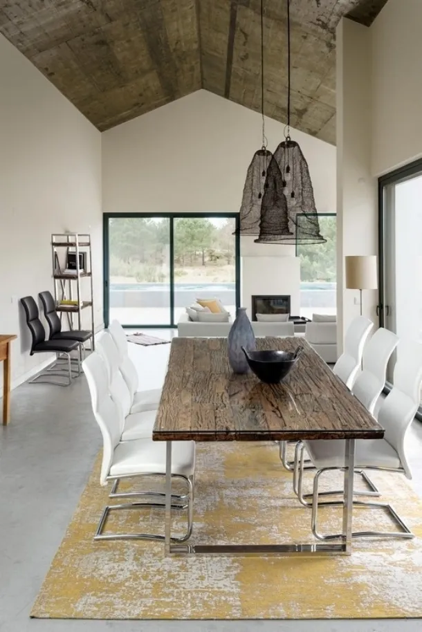 Stanton table with top made of recycled wood and glass by Bizzotto.