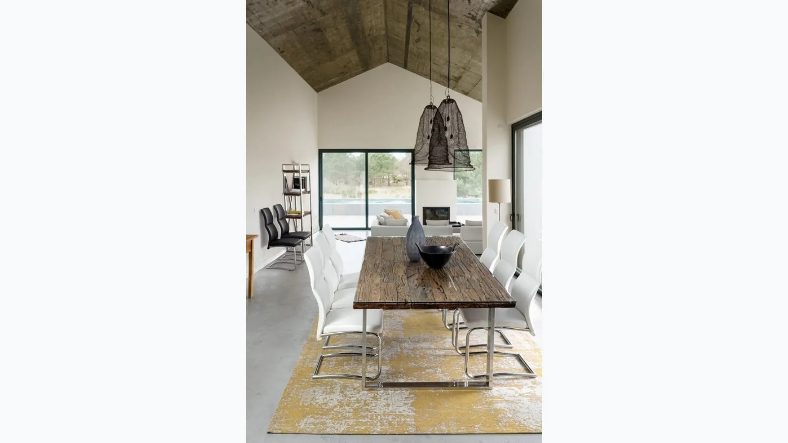 Stanton table with top made of recycled wood and glass by Bizzotto.