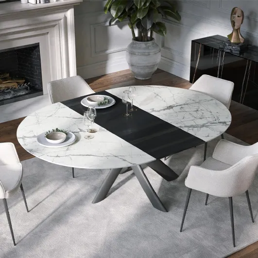 Extendable round table Style Round Ext in ceramic with wooden extender by Tonin Casa.