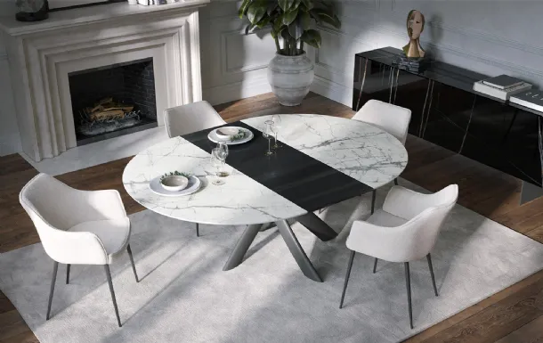 Extendable round table Style Round Ext in ceramic with wooden extender by Tonin Casa.