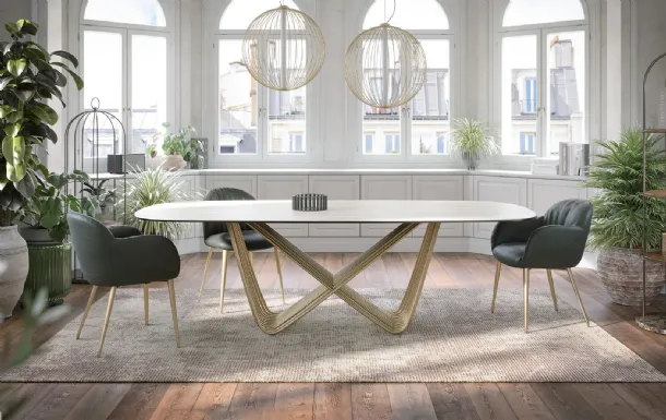 Tension table with travertine gres top by Tonin Casa.