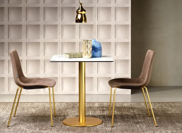 Tiffany round column table by Scab Design.