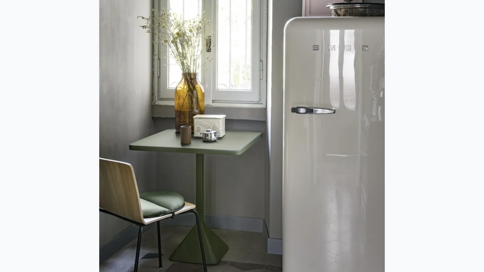 Square TNP table with cast iron base by Kristalia.