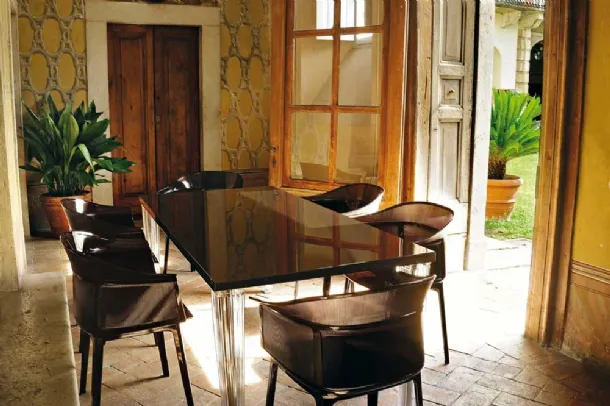 Top Top table with glass top and plexiglass base by Kartell.