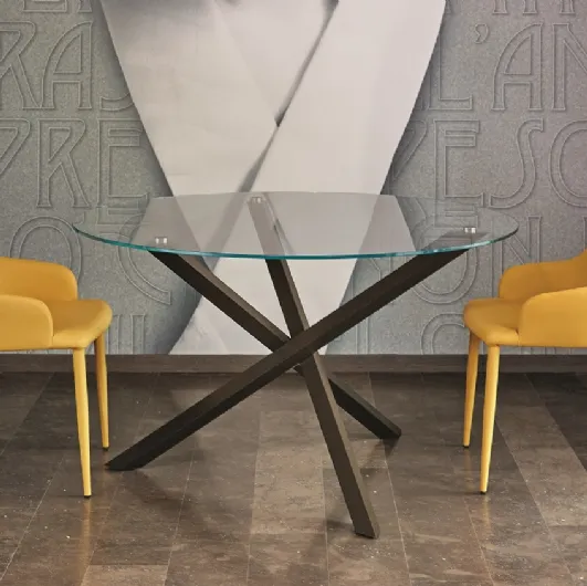 Round crystal table with dark brass lacquered steel base Trio by Ingenia.