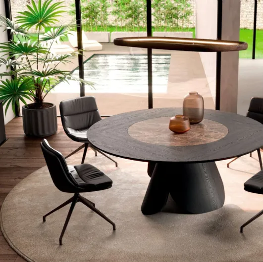 Extendable round wooden table Veliero with built-in ceramic Lazy Susan tray in the top by Ozzio.