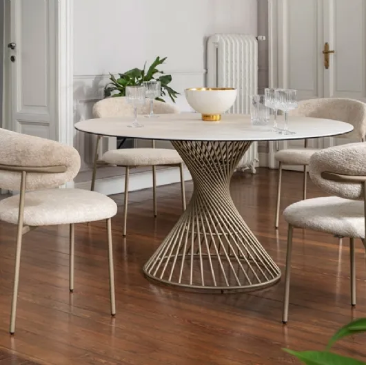 Round ceramic Vortex table by Calligaris