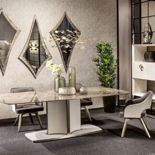 Ceramic table with base covered in Voyage leather by Cantori.