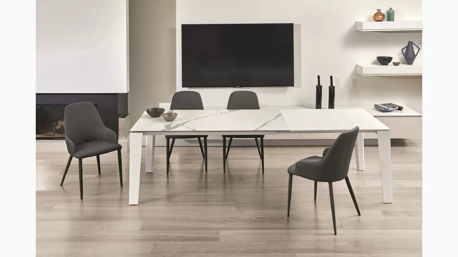 Extendable Winny table in supermarble ceramic by Ingenia.