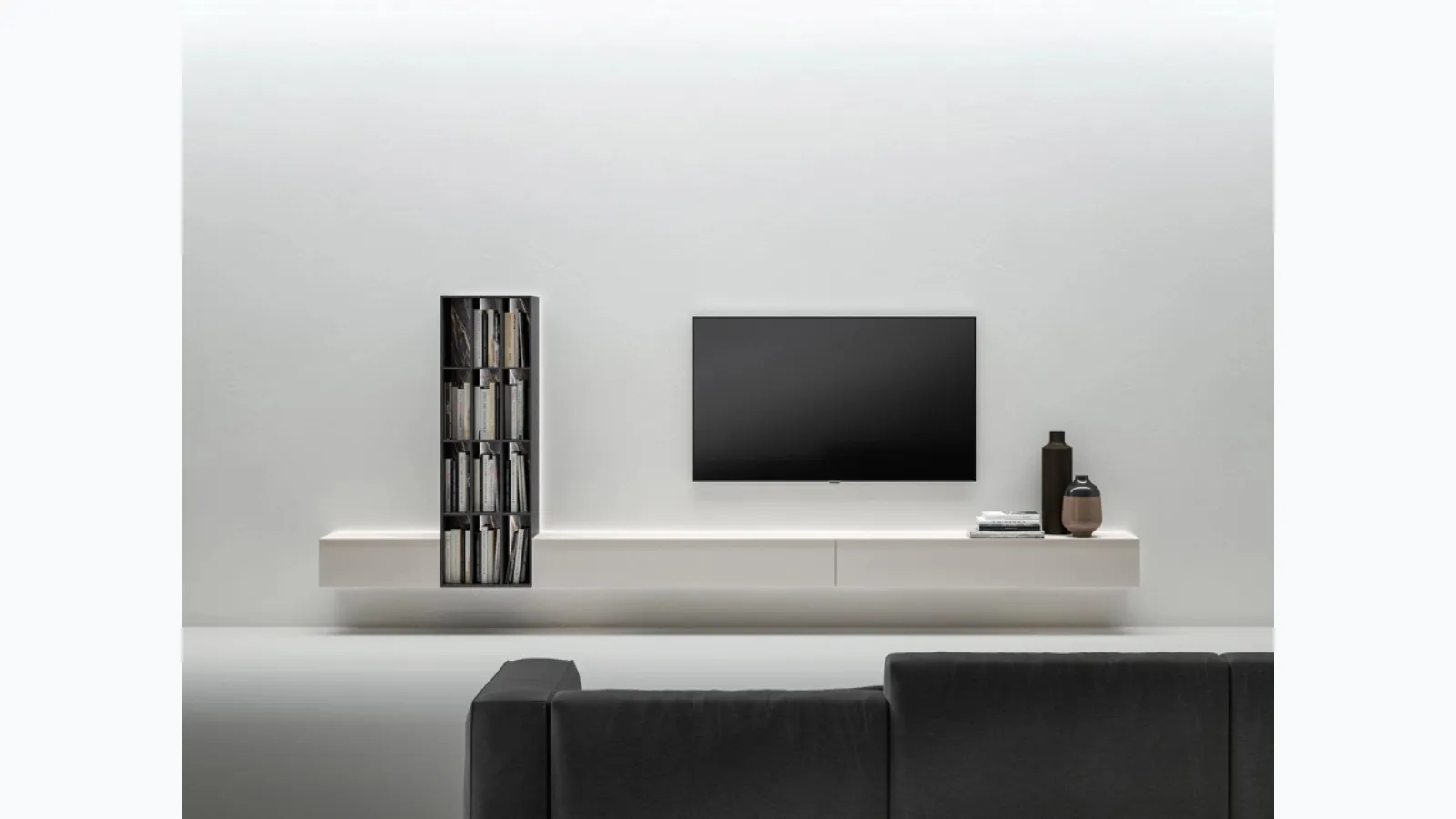 Suspended TV stand with bookshelf by Caccaro.